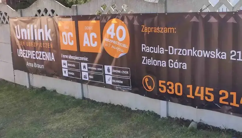 Baner reklamowy Unilink z ofertą ubezpieczeń OC, AC, samochodowych, mieszkaniowych, podróży, firmowych i rolniczych w Zielonej Górze.
